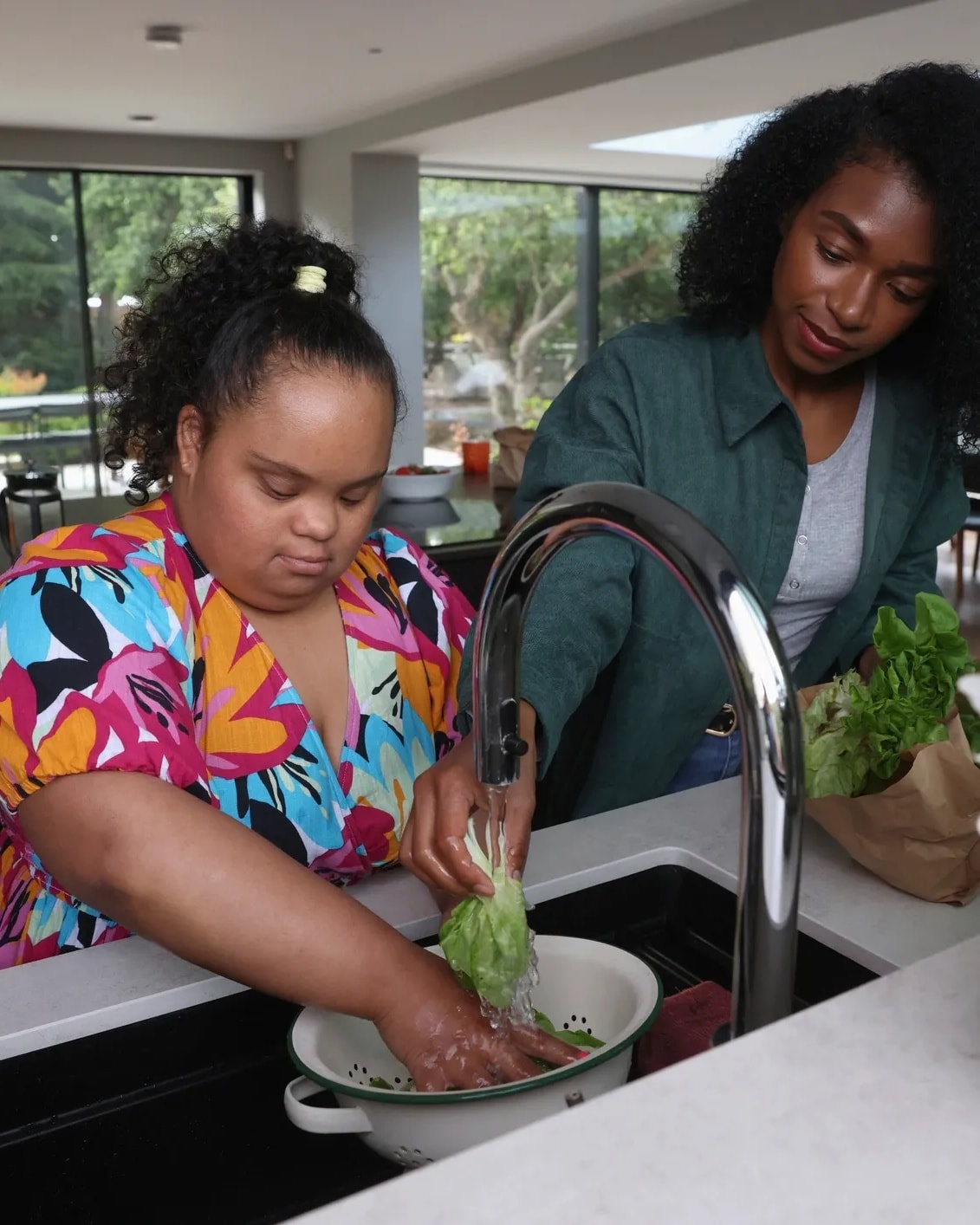 Support worker assisting an adult in the community